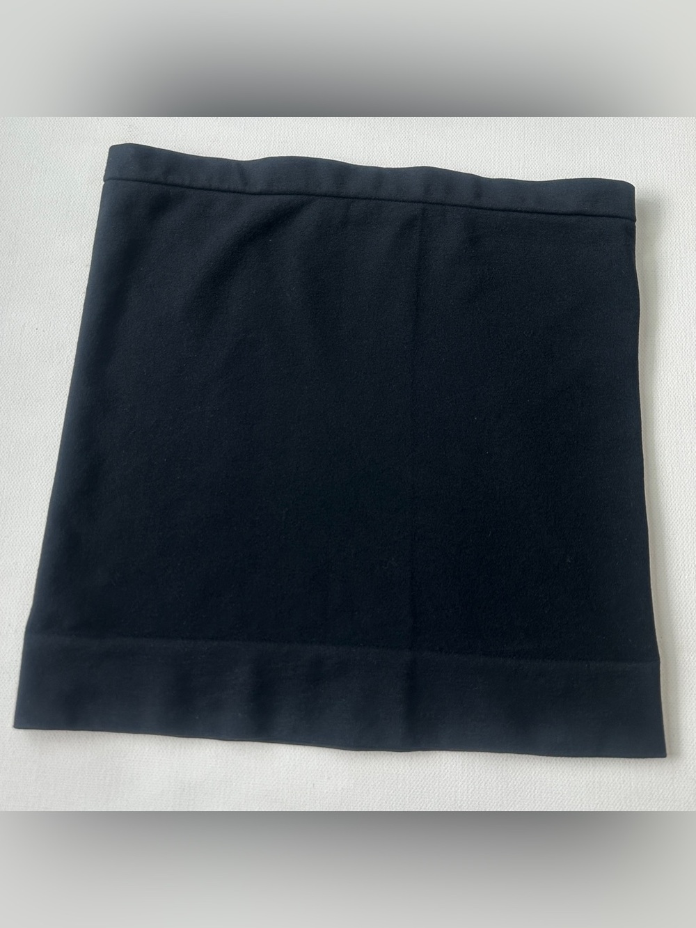 omen’s black seamless stretch knit tube garment.